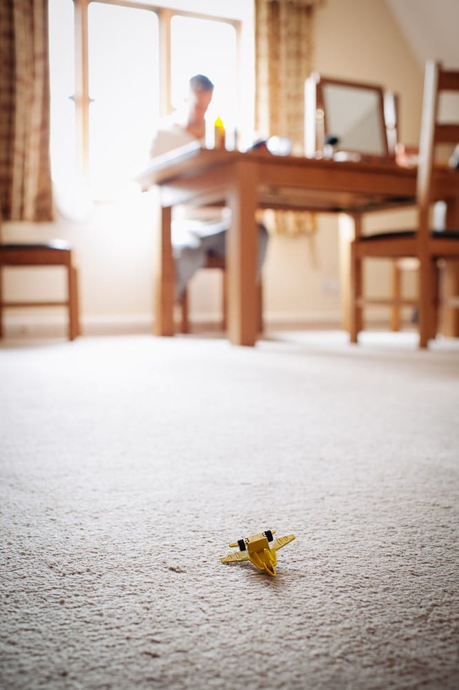 yellow toy plane on floor