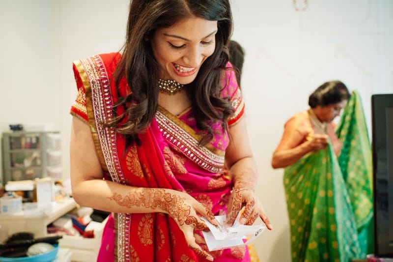 bride putting on her bindi