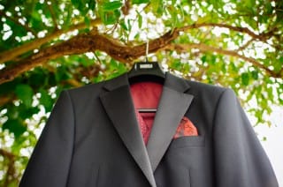 suit hanging in tree